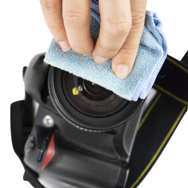 A person cleaning a camera with a Microfibre Clene - Large Micro-Fibre Cloth - x1 LMF001.